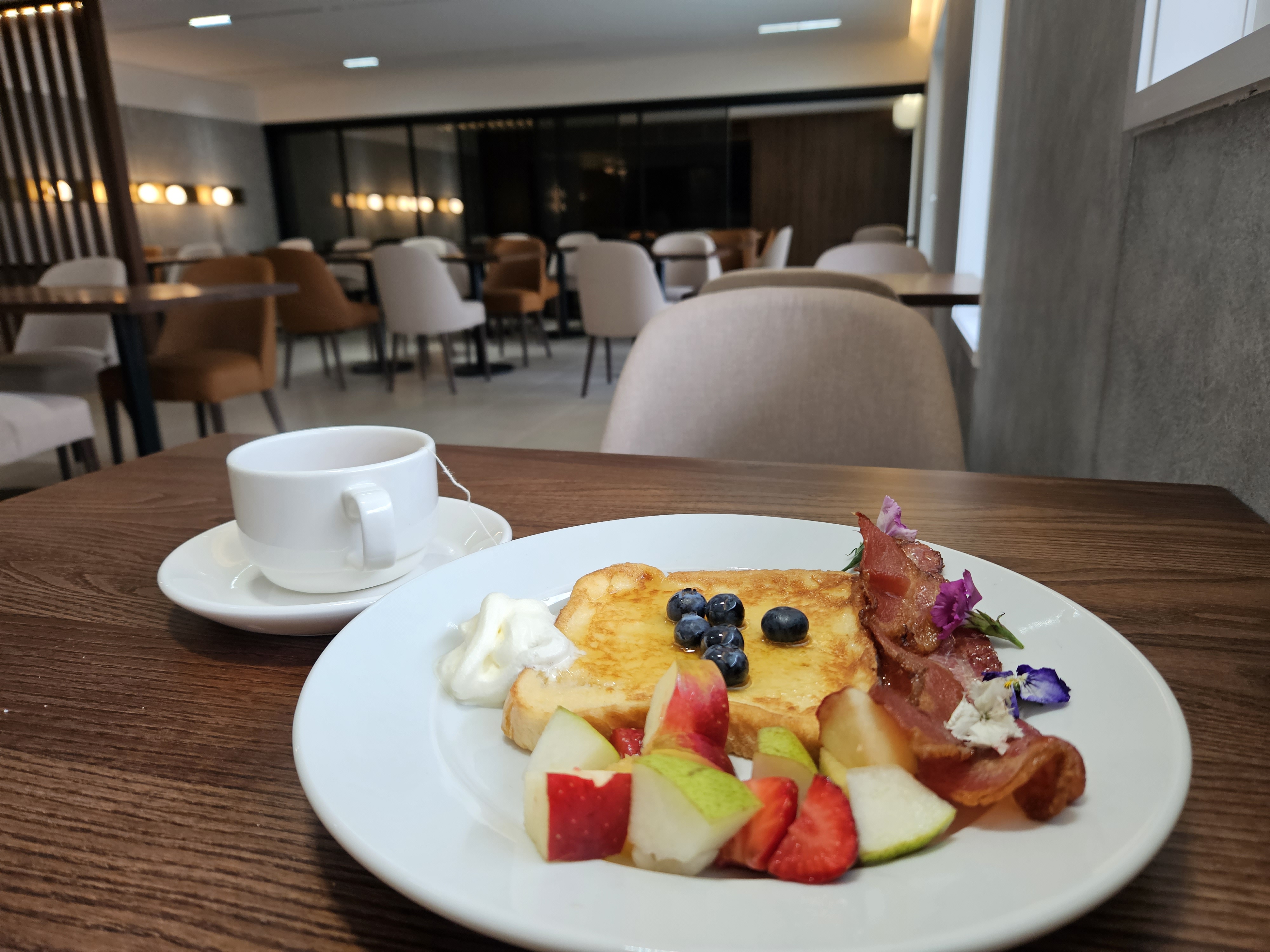 Hot breakfast buffet with eggs, bacon and continental items